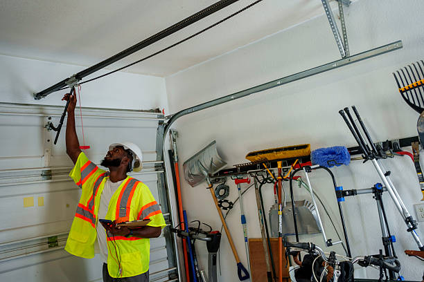 Professional Garage Door Roller Replacement technician working in Middleborough Center, MA